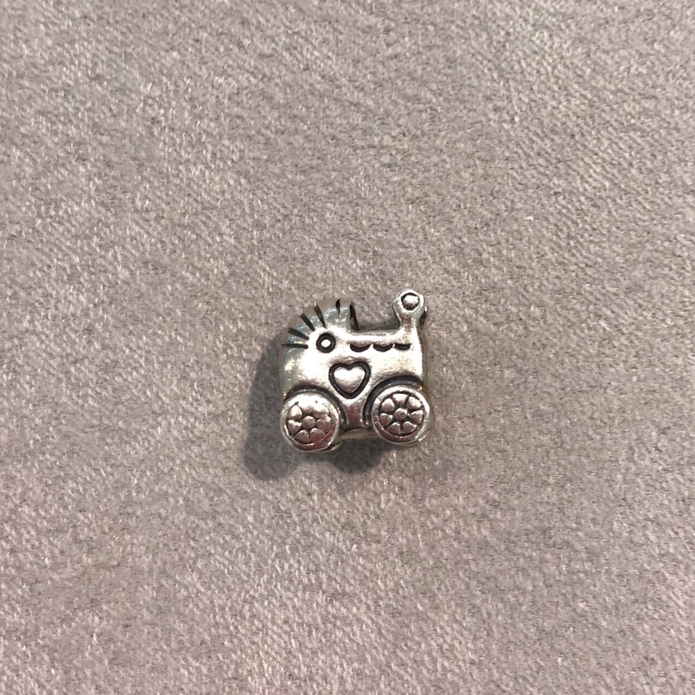 Silver buggy charm